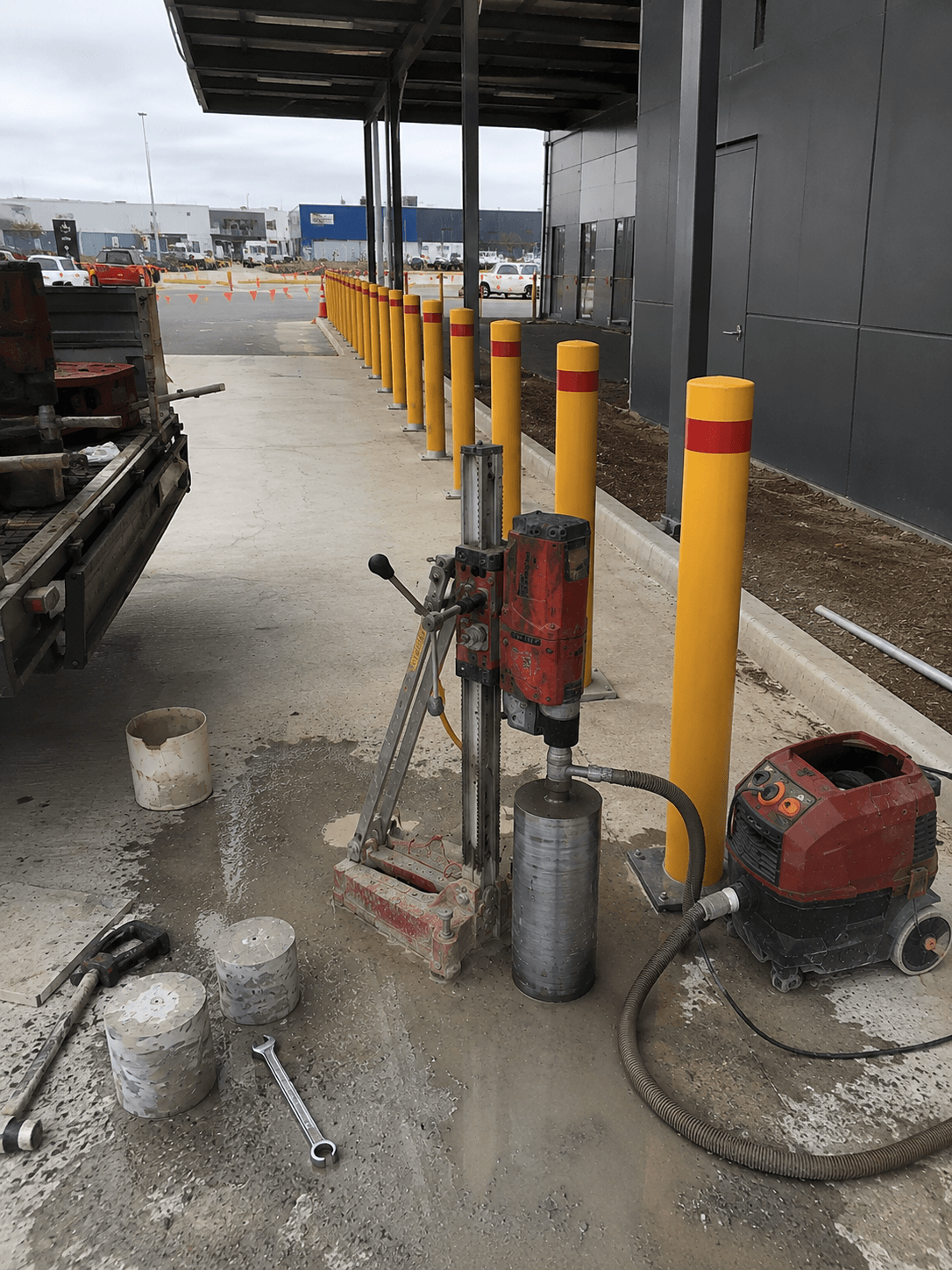 Bollard installation using concrete core drilling application.